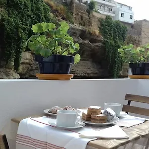 Casa Bajo La Roca Casa de Férias